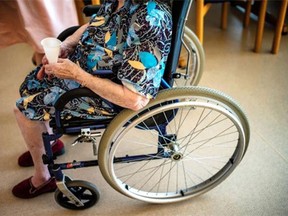 A senior woman sits in her wheelchair in a nursing home. (AFP/Getty Images files)