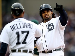 Detroit's Prince Fielder, right, reacts after hitting a single in the fourth inning against the Oakland Athletics during Game 3 of the American League Division Series at Comerica Park Monday. (Photo by Leon Halip/Getty Images)