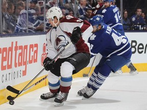 Colorado's Nathan MacKinnon, left, is shown in a file photo.