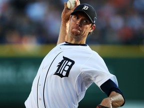 Detroit's Doug Fister throws a pitch in the first inning against the Oakland Athletics during Game 4 of the American League Division Series at Comerica Park. (Photo by Rob Carr/Getty Images)