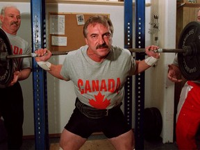 Belle River's Jerry Marentette works on his squats in 2001 (NICK BRANCACCIO/The Windsor Star).