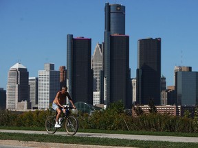 A cyclist takes a leisurely cruise along the waterfront in Windsor on Wednesday, October 2, 2013.          (TYLER BROWNBRIDGE/The Windsor Star)