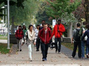 In this file photo, students make their way past Dillon Hall at the University of Windsor on Tuesday, Oct. 15, 2013. (TYLER BROWNBRIDGE/The Windsor Star)