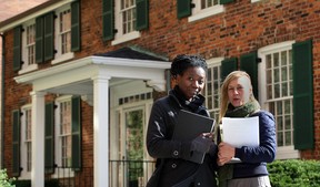 Toronto artist Camille Turner, left, and Alana Bartol of the Arts Council for Windsor and Region are shown Oct. 25, 2013, outside the historic Francois Baby house on Pitt Street. Turner is researching the Baby family's little-known history of slave-ownership. (Nick Brancaccio / The Windsor Star)