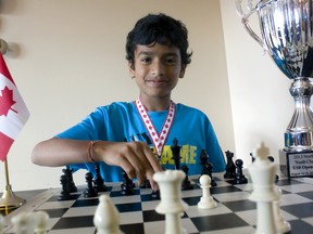 Chess player Rohan Talukdar, 10, sharpens his skills as he prepares to represent Canada in the 2013 World Youth Chess Championship in United Arab Emirates this December. (JOEL BOYCE/Windsor Star)