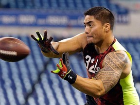 Former Notre Dame linebacker Manti Te'o runs a drill during the NFL scouting combine in Indianapolis in February. Next year, one of the super regional combines will be held at Ford Field in Detroit. (AP Photo/Dave Martin)
