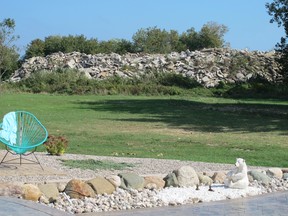 This is the view from a patio of a townhome on Mettawas Lane of the concrete blocks dumped onto land partly owned by the town of Kingsville.