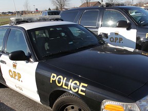 Vehicles outside Tecumseh OPP in Dec. 2012. (Dan Janisse / The Windsor Star)