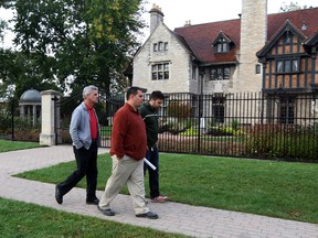 Area resident Adriano Ciotoli, right, meets with City of Windsor parks officials John Miceli and Mike Clement, left, about a construction project at Willistead Park Tuesday October 15, 2013. (NICK BRANCACCIO/The Windsor Star)