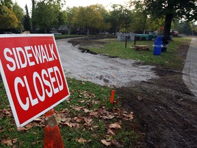 Area residents meet with City of Windsor Parks officials about sidewalk construction project at Willistead Park Tuesday October 15, 2013. (NICK BRANCACCIO/The Windsor Star)