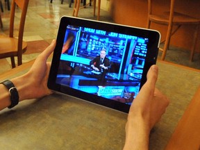 The Windsor Public Library is offering card holders the option of downloading movies and TV shows on their tablets, personal computers or smart phones. (Postmedia News files)