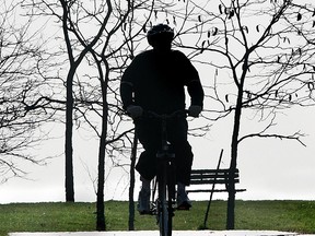 A Windsor cyclist is shown in silhouette in this Nov. 2006 file photo. (Dan Janisse / The Windsor Star)