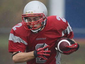 Brennan's Thomas Whitter looks for a hole during a playoff game against Sandwich Thurs. Oct. 31, 2013,  LaSalle. (DAN JANISSE/The Windsor Star)