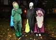 These youngsters were out on Thurs. Oct. 31, 2013, a rainy Halloween night along Victoria Ave. in Windsor, Ont.  (DAN JANISSE/The Windsor Star)