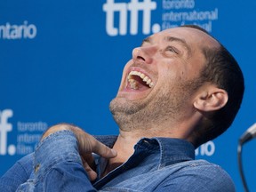 Follow what actor Jude Law is doing - laugh - and reduce that stress load. (GALIT RODAN / Canadian Press files)