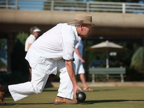 - District 9's Eldon McFadyen takes his shot while competing in the gold medal match in the Seniors Lawn Bowling Championships at the Windsor Lawn Bowling Club, Wednesday, August 1, 2012.  (DAX MELMER/The Windsor Star)