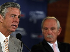 Tigers GM Dave Dombrowski, left, and manager Jim Leyland announces Leyland's stepping down as the team manager at Comerica Park in Detroit on Monday, October 21, 2013. (TYLER BROWNBRIDGE/The Windsor Star)