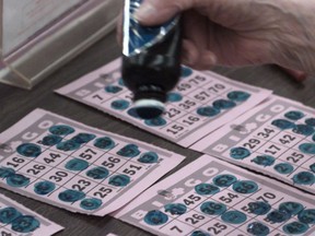 A person plays a series of bingo cards using their bingo dabber. (Postmedia News files)