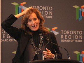 Sandra Pupatello, CEO of the Windsor Essex Economic Development Corporation gestures during her speech promoting Windsor at a Toronto Region Board of Trade luncheon, Thursday, Oct. 24, 2013, in Toronto.  (DAN JANISSE/The Windsor Star)