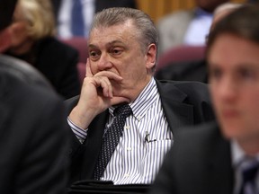 The Ambassador Bridge Company president Dan Stampler listens in at a Property Standards Committee meeting at city hall in Windsor on Monday, October 28, 2013.           (TYLER BROWNBRIDGE/The Windsor Star)