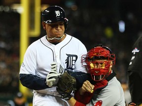 Miguel Cabrera of the Detroit Tigers is out at home by David Ross  of the Boston Red Sox in the first inning of Game Five of the American League Championship Series at Comerica Park on October 17, 2013 in Detroit. (Mike Ehrmann/Getty Images)