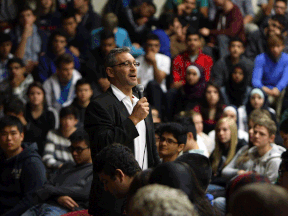 Comedian Steve Levine makes his Funny Money presentation to about 850 students in grades 11 and 12 at Vincent Massey Secondary School in Windsor. (TYLER BROWNBRIDGE/The Windsor Star)