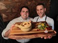 Chef Chris Chittle, left,  and chef Johnny Oran from Foia Restaurant and Lounge display the parsley root and parsnip vegan pot pie and an heirloom beet arugula salad for a vegan Thanksgiving. (JASON KRYK / The Windsor Star)