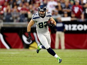 LaSalle native Luke Willson of the Seattle Seahawks runs after making a catch  against the Arizona Cardinals at the University of Phoenix Stadium on October 17, 2013 in Glendale, Arizona.  (Christian Petersen/Getty Images)