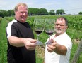 John Fancsy, owner of Viewpointe Estate Winery, and viticulturalist Peter Pfeifer near Colchester on June 5, 2010 . (Windsor Star files)