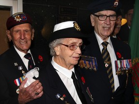 Veterans Ralph Mayville, left, Dorothy Grondin and Larry Costello joined with other veterans at City Hall on Nov. 4, 2013,  to protest the closure of Windsor's Veteran Affairs office. (NICK BRANCACCIO/The Windsor Star)