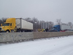 OPP work to clear multiple collisions on the 401 in London, Saturday, Nov. 23, 2013. (Special to The Star Bennett, Shannon)