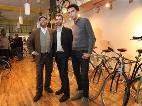 City Cyclery co-owners Chris Holt, left, Ron Drouillard and Stephen Hargreaves show off their new location in Walkerville, Fri. Nov. 1, 2013, during an open house. (DAN JANISSE/The Windsor Star)