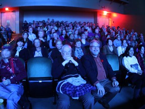 Moviegoers watch Haute Cuisine on Friday night at the Windsor International Film Festival at the Capitol Theatre, Nov. 8, 2013. (DAX MELMER/The Windsor Star)