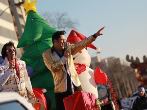 Elvis impersonators participate in the Holiday Parade on Ouellette Avenue , Saturday, Nov. 30, 2013.  (DAX MELMER/The Windsor Star)
