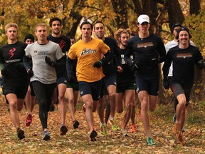 Members of the University of Windsor's cross-country team go for a workout at Malden Park. (JASON KRYK/The Windsor Star)