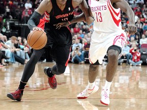 Toronto's DeMar DeRozan, left, is covered by Houston's James Harden Monday in Houston. (AP Photo/Pat Sullivan)