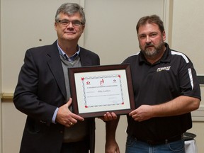 Windsor's Mike Soulliere, right, receives an award from the Canadian Lacrosse Association. (Courtesy of the Canadian Lacrosse Association)