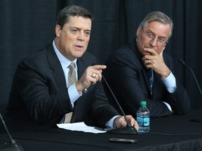 Buffalo owner Terry Pegula, right, listens to Pat LaFontaine, the new president of hockey operations for the Sabres. (AP Photo/The Buffalo News, Charles Lewis)
