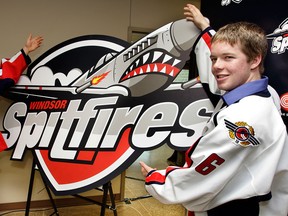 Spits defenceman Ryan Ellis, right, and Taylor Hall show off the tean's new uniforms at a press conference in 2008. (Star file photo)