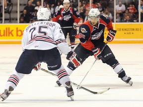 Windsor's Josh Ho-Sang, right, is watched by Oshawa's Colin Suellentrop at General Motors Centre. (Photo by Ryan Pfeiffer/Durham News)