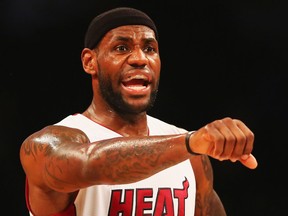 Miami's LeBron James reacts to a call against the Brooklyn Nets. (Photo by Al Bello/Getty Images)