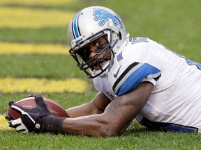 Detroit wide receiver Calvin Johnson lays in the end zone after catching a touchdown against the Pittsburgh Steelers. (AP Photo/Gene J. Puskar)