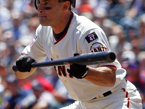 Omar Vizquel of the San Francisco Giants bunts against the Washington Nationals at AT&T Park in San Francisco in 2007. (Photo by Lisa Blumenfeld/Getty Images)
