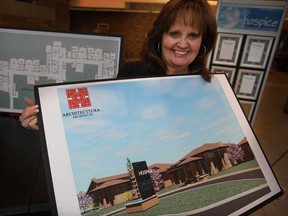 The Hospice of Windsor and Essex County Inc. Executive Director Carol Derbyshire with plans on Monday, Nov. 4, 2013, for a 10-bed expansion to be built in Essex County. (NICK BRANCACCIO/The Windsor Star)