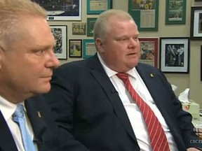 Rob Ford, right, and brother Doug being interviewed on CBC. (Screengrab)