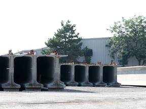 Girders being used for the Herb Gray Parkway are pictured at a storage facility on Russell Street in West Windsor, Monday, July 22, 2013.  (DAX MELMER/The Windsor Star)