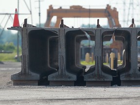 Girders being used for the Herb Gray Parkway are pictured at a storage facility on Russell Street in West Windsor, Monday, July 22, 2013. (DAX MELMER/The Windsor Star)