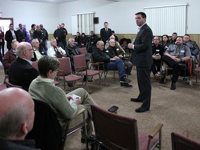 Ontario PC leader Tim Hudak held a town hall meeting Thurs. Nov. 28, 2013, in Leamington, Ont. to speak to the community about the closure of the Heinz plant. Hudak (C) speaks to the group during the event. (DAN JANISSE/The Windsor Star)