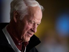 Hockey great Gordie Howe watches the Vancouver Canucks and San Jose Sharks play during an NHL hockey game in Vancouver on  Nov. 14, 2013. (THE CANADIAN PRESS/Darryl Dyck)