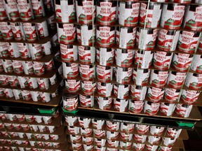 Heinz tomato juice cans are stacked at the H.J. Heinz Ltd. plant in Leamington, Ont., on Sept. 23, 2009. (JASON KRYK/ THE WINDSOR STAR